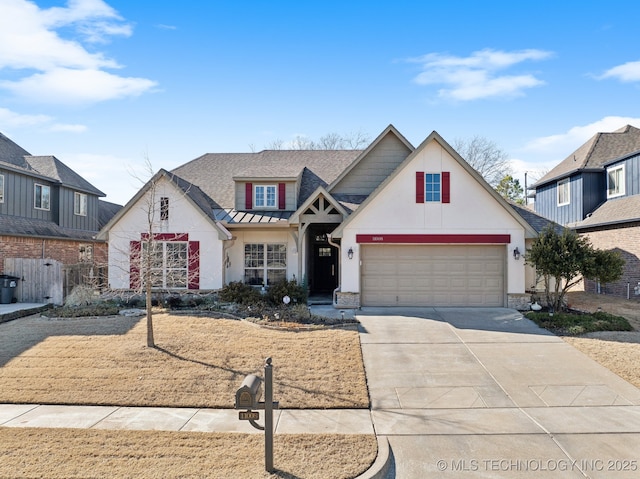 view of front of property with concrete driveway, fence, a garage, and roof with shingles