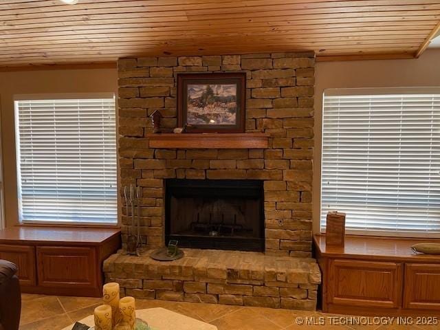 room details featuring a fireplace and wood ceiling