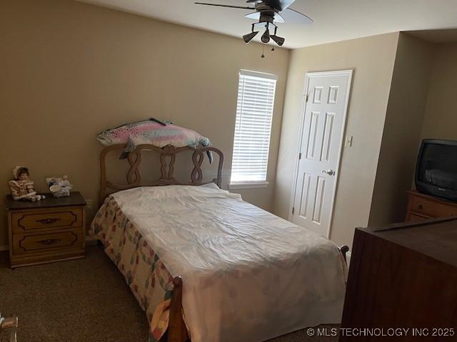 bedroom featuring carpet flooring and ceiling fan