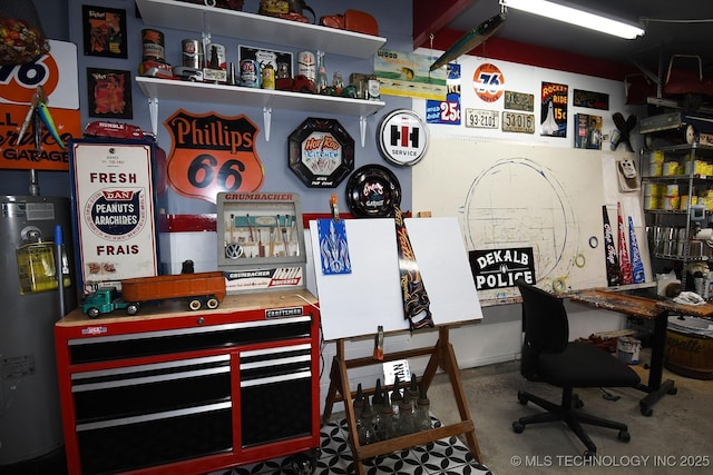 interior space featuring electric water heater and concrete floors