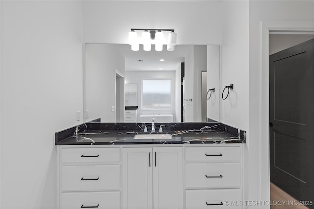 full bathroom featuring vanity