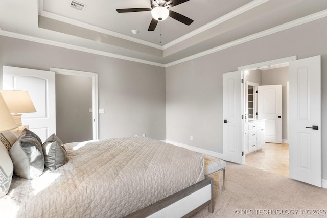 bedroom featuring visible vents, a tray ceiling, ornamental molding, light carpet, and light tile patterned flooring