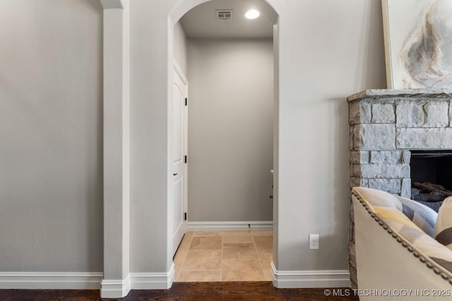 corridor with visible vents and baseboards