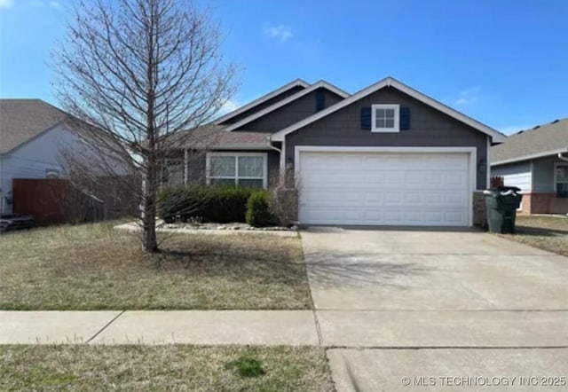 view of front of home featuring an attached garage and concrete driveway