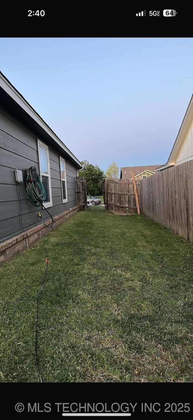 view of yard featuring fence