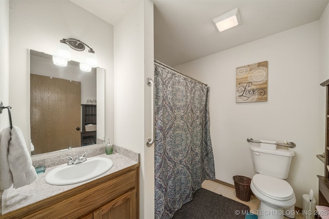 full bathroom featuring vanity, tile patterned floors, curtained shower, and toilet