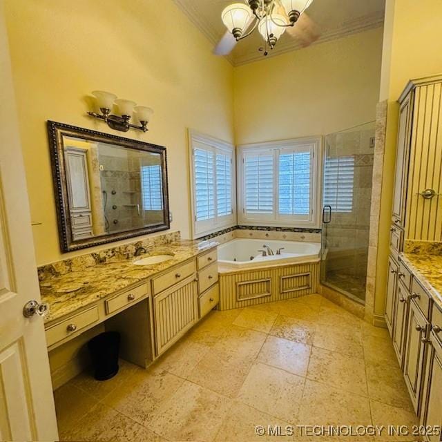 bathroom featuring vanity, an inviting chandelier, ornamental molding, a shower stall, and a bath