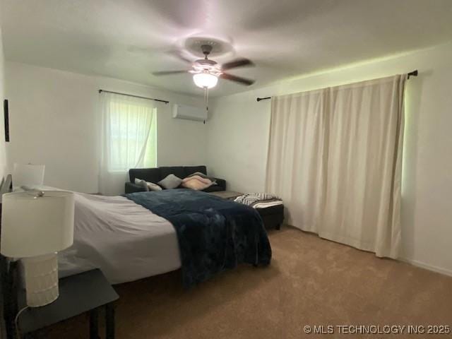 bedroom featuring ceiling fan, a wall mounted air conditioner, and light carpet