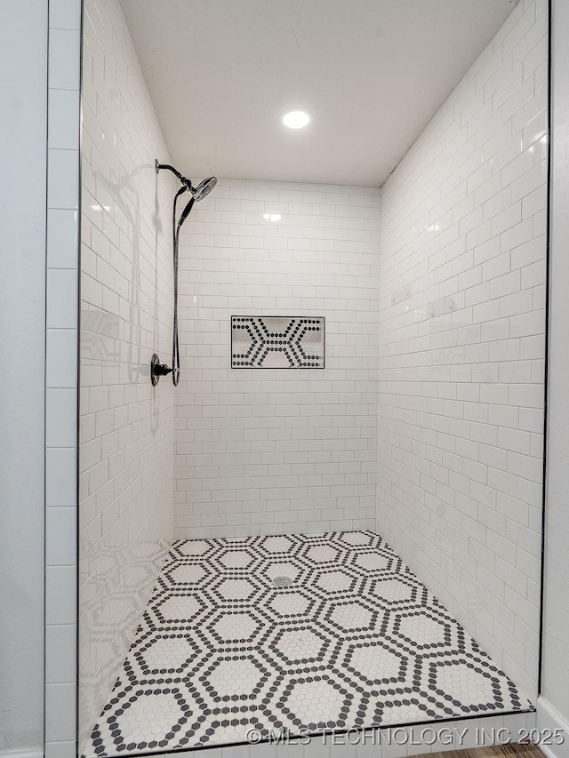 bathroom with a stall shower