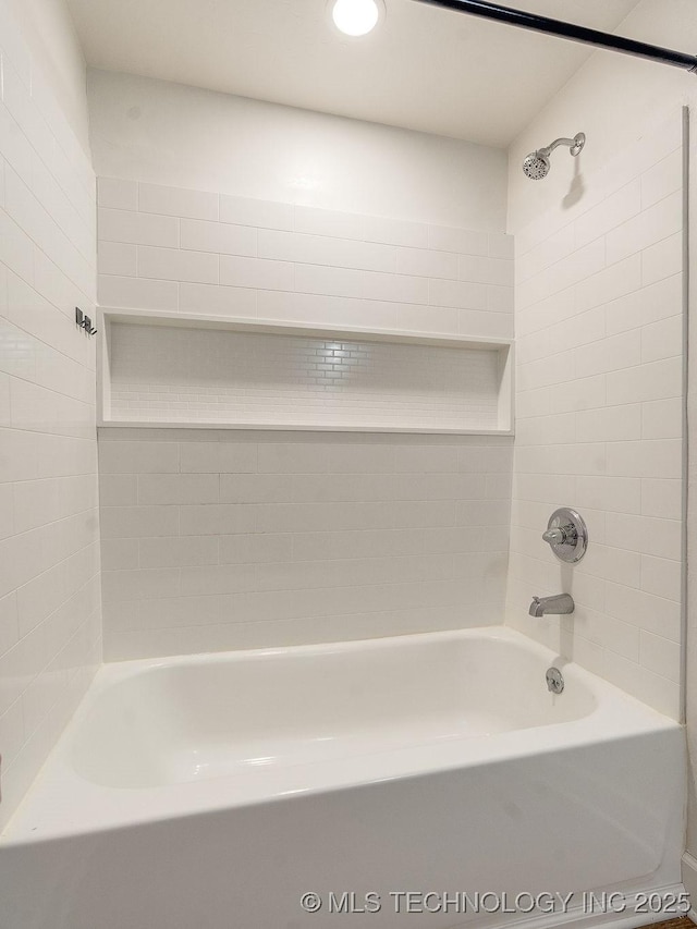 full bathroom featuring  shower combination