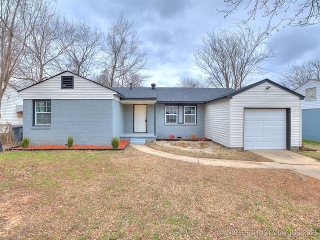 ranch-style home featuring a front yard, brick siding, concrete driveway, and an attached garage