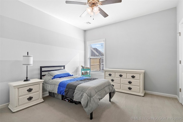 bedroom with light carpet, visible vents, ceiling fan, and baseboards