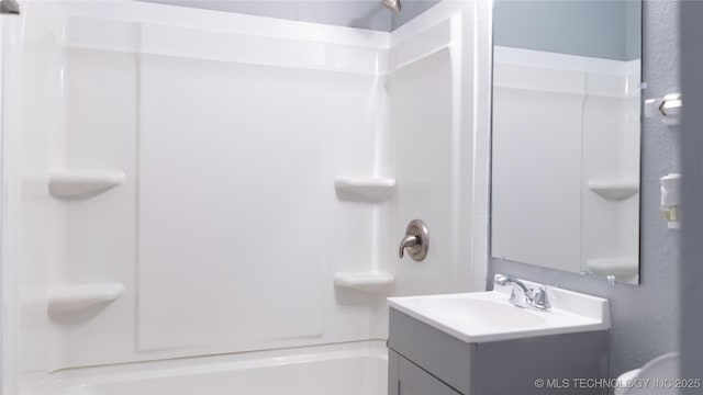 bathroom with  shower combination and vanity