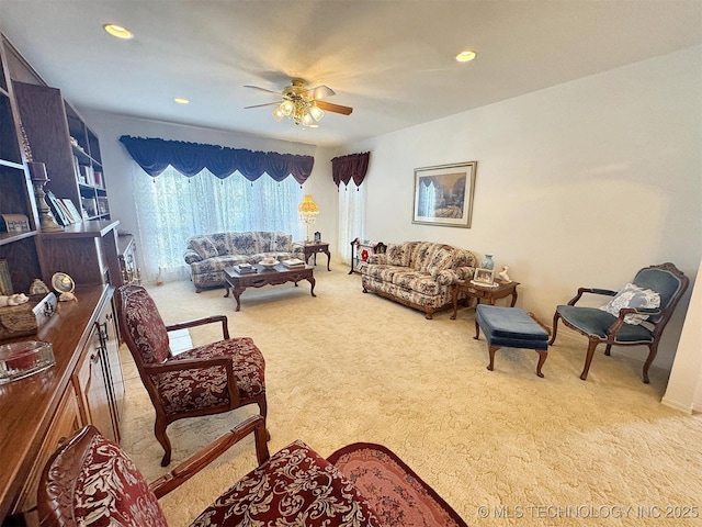 carpeted living room featuring recessed lighting and ceiling fan