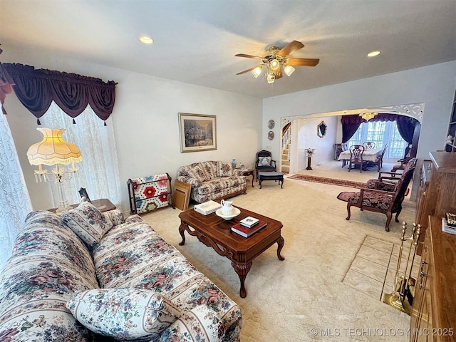 living area featuring recessed lighting, carpet floors, and ceiling fan