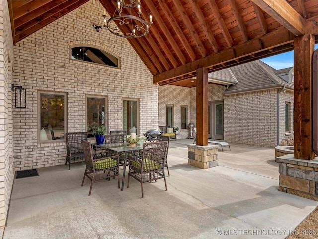 view of patio featuring outdoor dining area