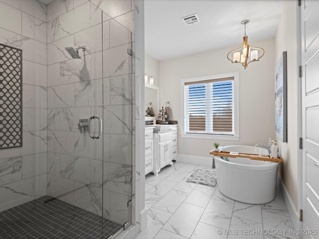 full bathroom featuring visible vents, marble finish floor, a stall shower, and vanity