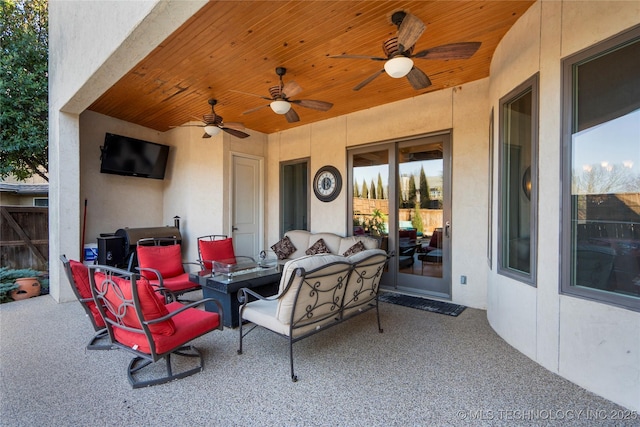 view of patio / terrace with ceiling fan and an outdoor hangout area