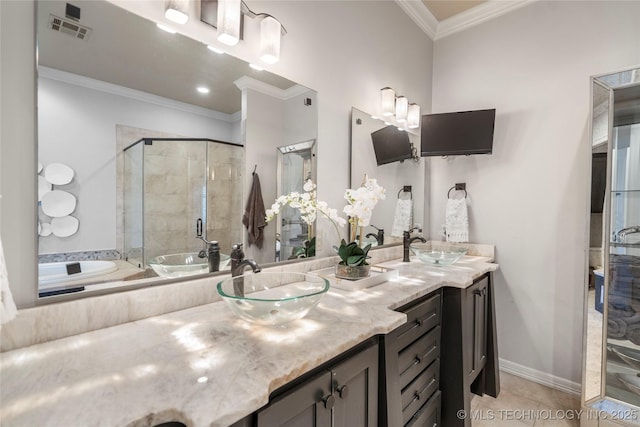 full bathroom featuring a sink, visible vents, a stall shower, and ornamental molding