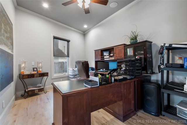 office space with crown molding, baseboards, light wood finished floors, and ceiling fan