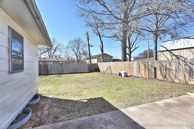 view of yard with a fenced backyard