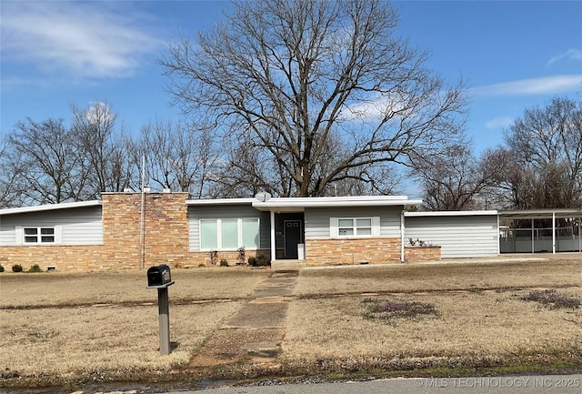 1303 Lehigh Ave, Hartshorne, OK 74547 - view of front of home with brick siding