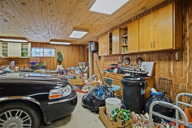 garage with wooden walls and wood ceiling