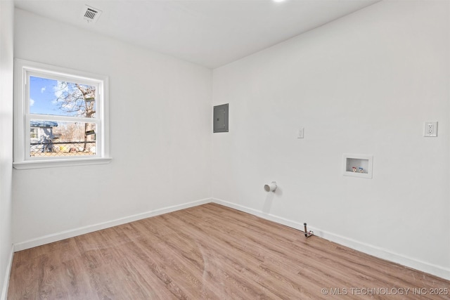 laundry area featuring visible vents, baseboards, laundry area, hookup for a washing machine, and wood finished floors