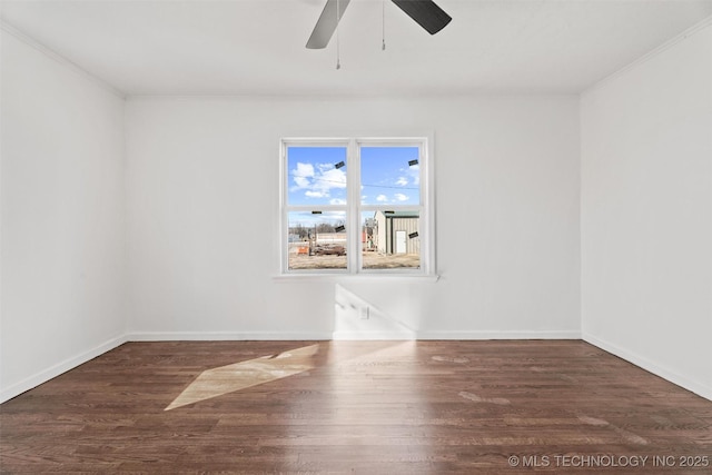 unfurnished room with a ceiling fan, wood finished floors, baseboards, and ornamental molding