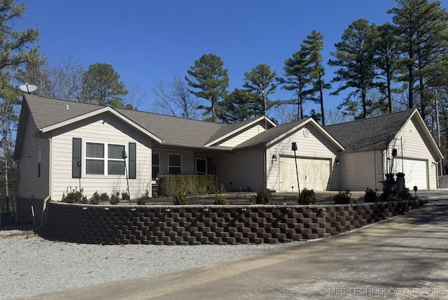 ranch-style home with a garage