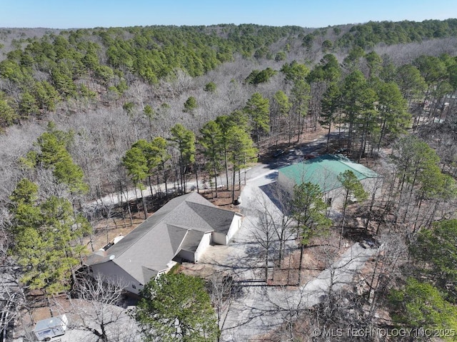 aerial view featuring a view of trees