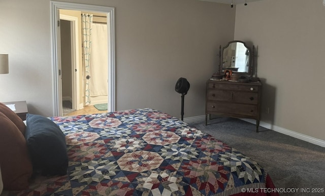 bedroom with carpet flooring and baseboards