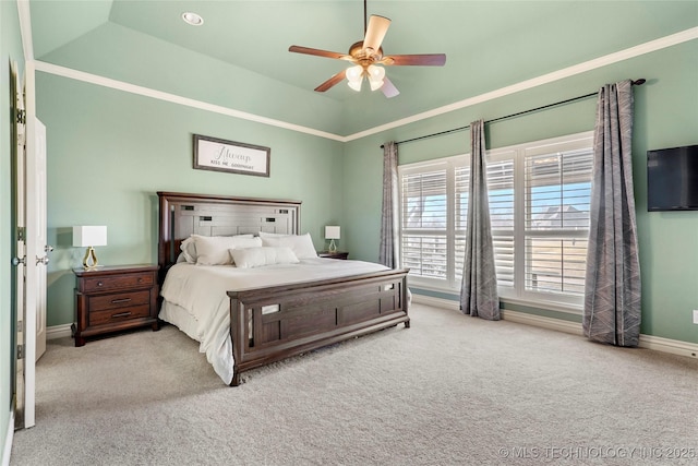 carpeted bedroom with ceiling fan, baseboards, and vaulted ceiling