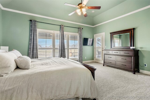 bedroom featuring ceiling fan, baseboards, lofted ceiling, ornamental molding, and light carpet