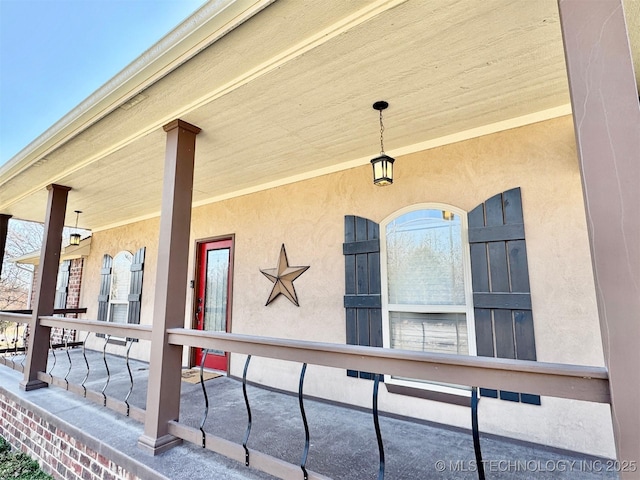 exterior space featuring stucco siding