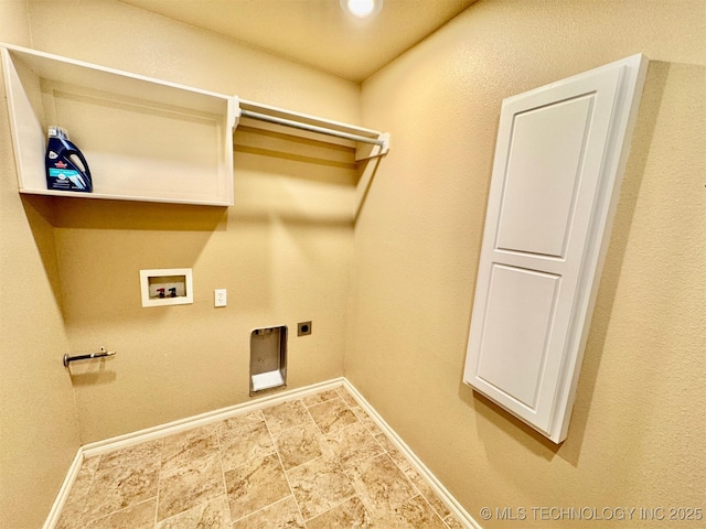 washroom featuring hookup for a washing machine, baseboards, laundry area, electric dryer hookup, and stone finish flooring