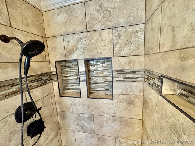 details featuring tiled shower