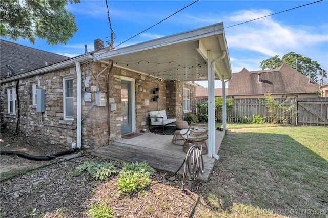 view of yard with a patio area and fence