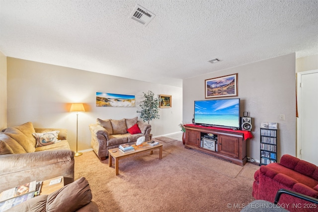 living area featuring carpet flooring, visible vents, and a textured ceiling