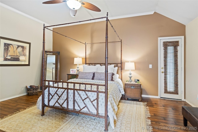 bedroom with crown molding, baseboards, lofted ceiling, wood finished floors, and a ceiling fan