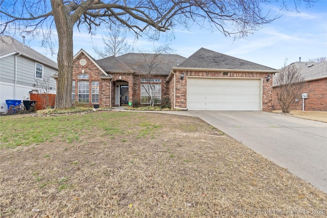 single story home with brick siding, a shingled roof, a front lawn, concrete driveway, and an attached garage