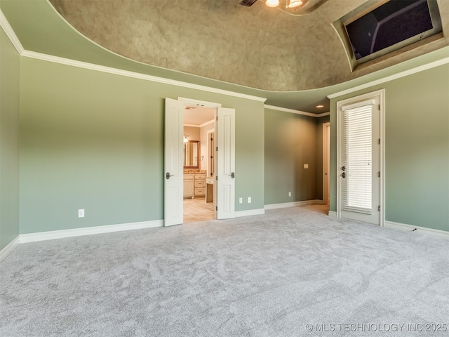 12491 S 105th Ave E, Bixby, OK 74008 - carpeted empty room featuring baseboards, ornamental molding, lofted ceiling, and ceiling fan