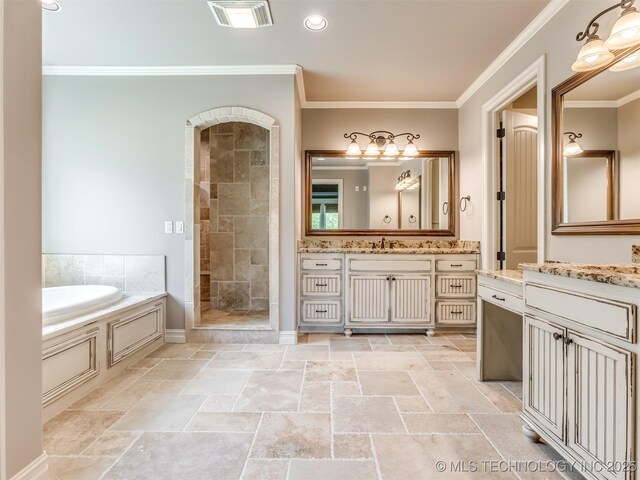 12491 S 105th Ave E, Bixby, OK 74008 - bathroom featuring a bath, tiled shower, vanity, ornamental molding, and stone tile flooring