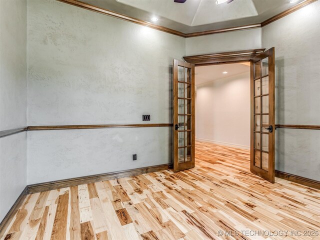 12491 S 105th Ave E, Bixby, OK 74008 - unfurnished room with french doors, wood finished floors, and ornamental molding