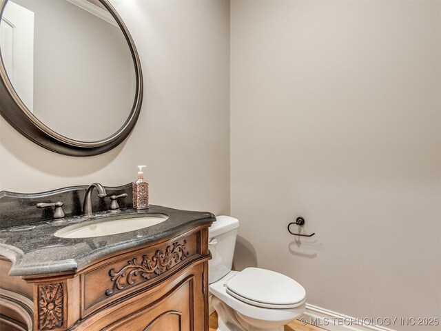 12491 S 105th Ave E, Bixby, OK 74008 - half bathroom with vanity and toilet
