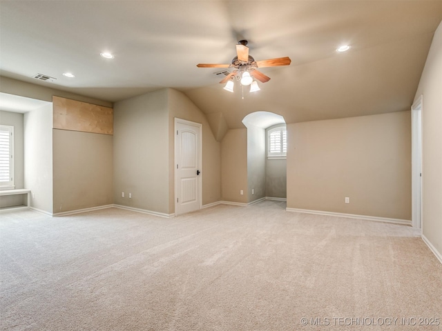 12491 S 105th Ave E, Bixby, OK 74008 - additional living space featuring ceiling fan, light carpet, recessed lighting, arched walkways, and baseboards