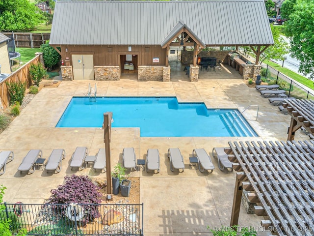 12491 S 105th Ave E, Bixby, OK 74008 - community pool featuring a patio