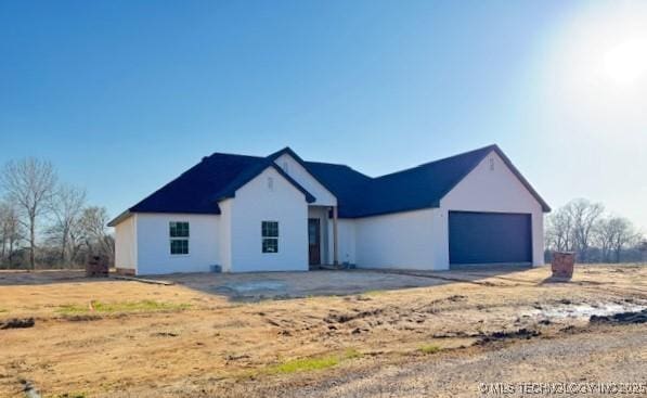 view of front facade with an attached garage