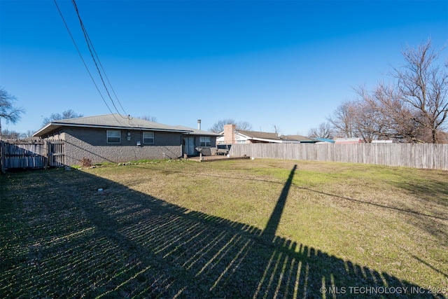 view of yard with fence