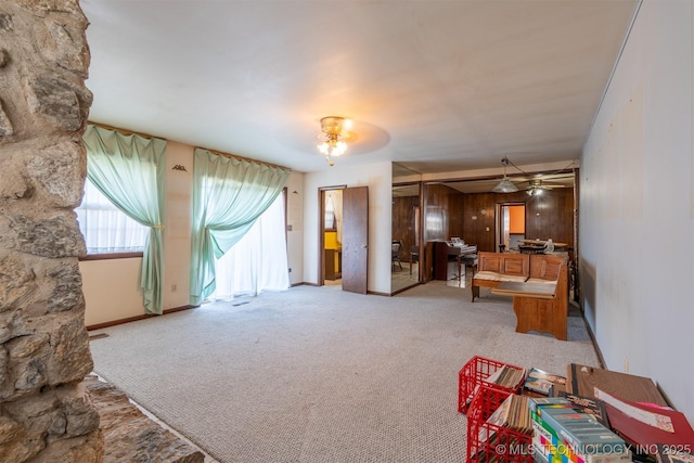 living room featuring light carpet